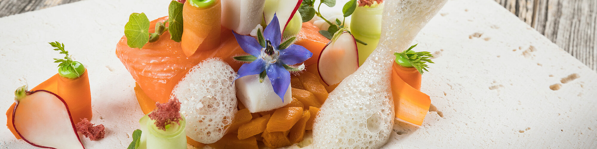 Meal in the toque-awarded restaurant in your sports hotel in Kitzbühel