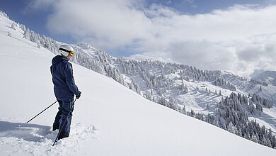 Skiing during a winter holiday in the Kitzbühel Alps in Tirol